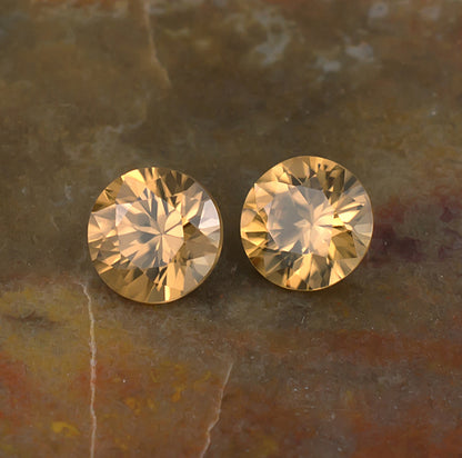 5.50mm Golden Zircon Colored Gemstone Pair Top View Natural Background
