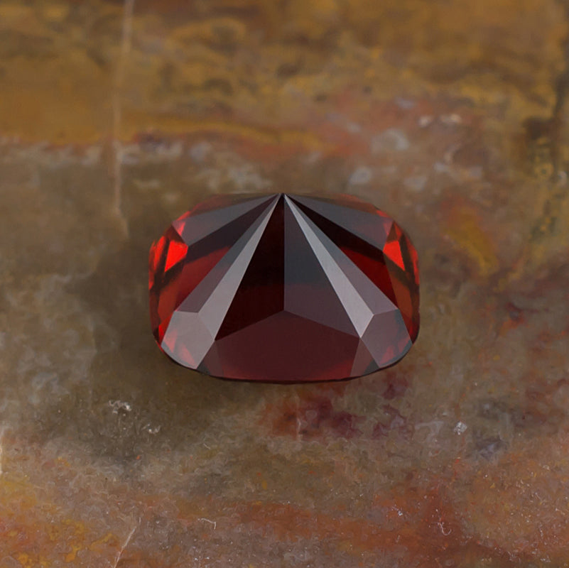 6.45ct Hessonite Garnet Colored Gemstone Bottom View Natural Background
