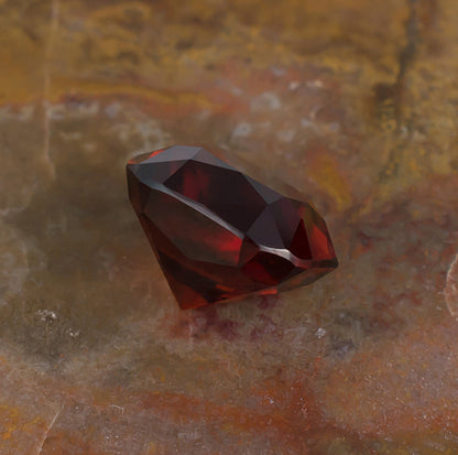 6.45ct Hessonite Garnet Colored Gemstone Side View Natural Background
