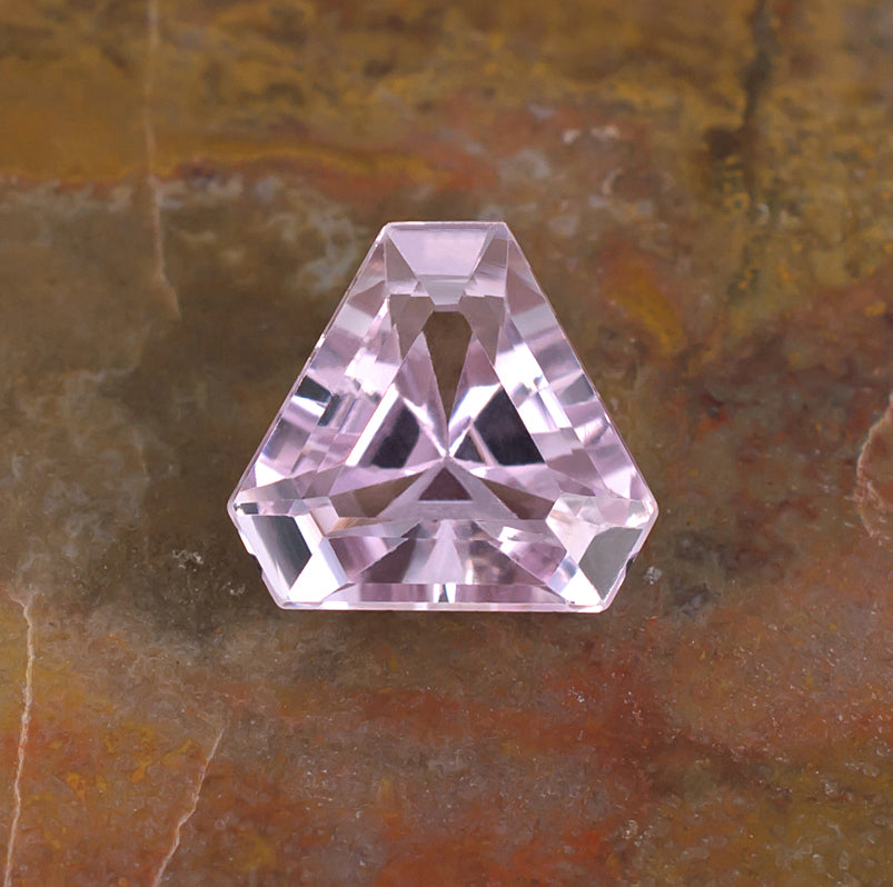 6.57ct Kunzite Colored Gemstone Crown View Natural Background
