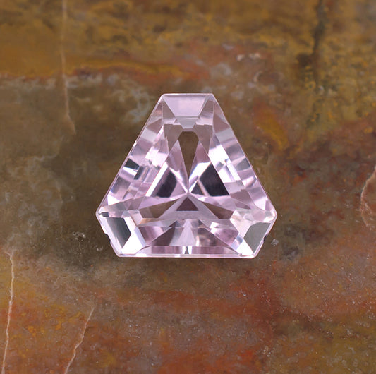 6.57ct Kunzite Colored Gemstone Crown View Natural Background
