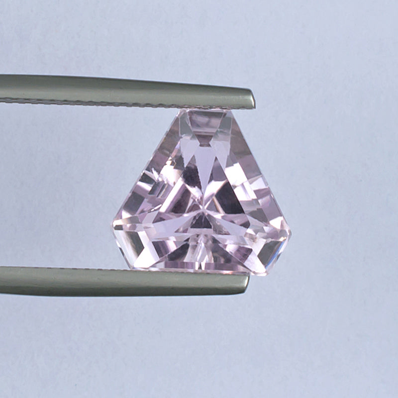 6.57ct Kunzite Colored Gemstone Top View White Background
