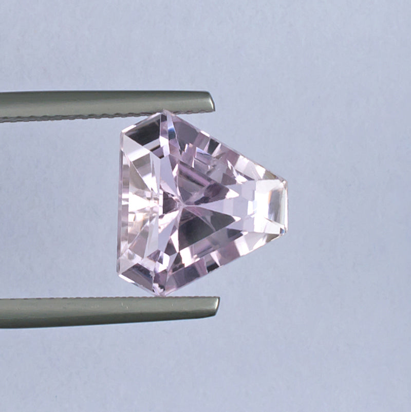 6.57ct Kunzite Colored Gemstone Top View White Background 
