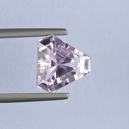6.57ct Kunzite Colored Gemstone Top View White Background 
