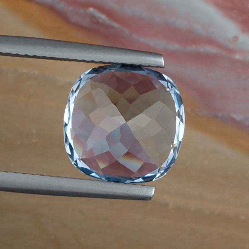 6.89ct Aquamarine Colored Gemstone Bottom View Natural Background 
