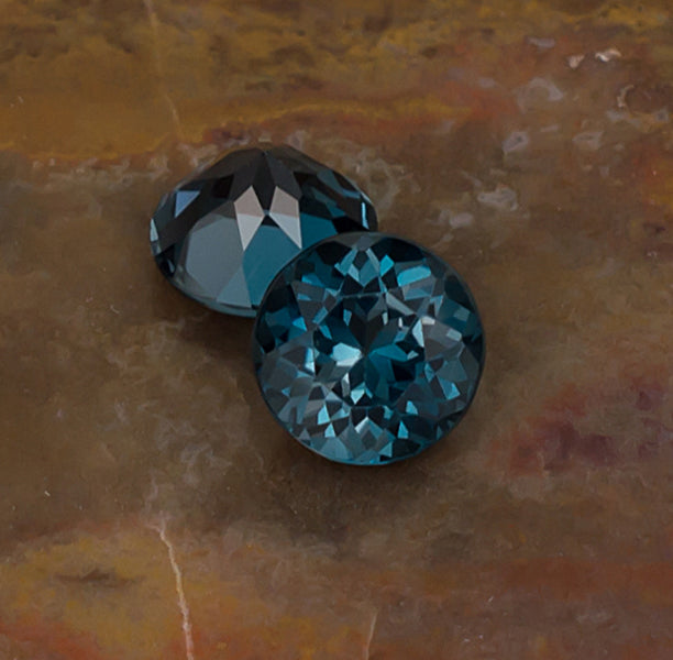 7.00mm Blue Topaz Colored Gemstone Pair Front & Bottom View Natural Background

