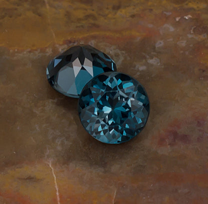 7.00mm Blue Topaz Colored Gemstone Pair Front & Bottom View Natural Background
