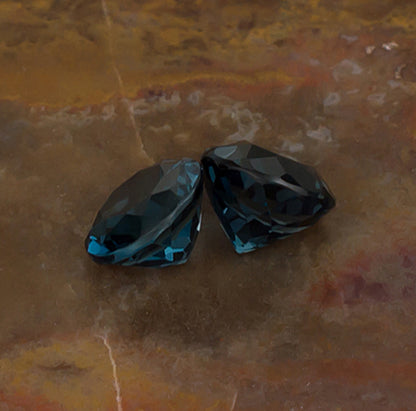 7.00mm Blue Topaz Colored Gemstone Pair Front View Natural Background
