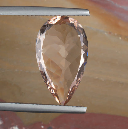 7.12ct Morganite Colored Gemstone Bottom View Natural Background
