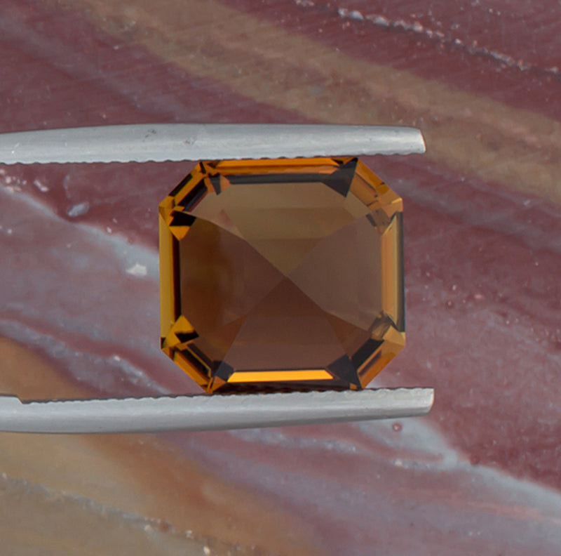 7.61ct Golden Tourmaline Bottom View Natural Background 
