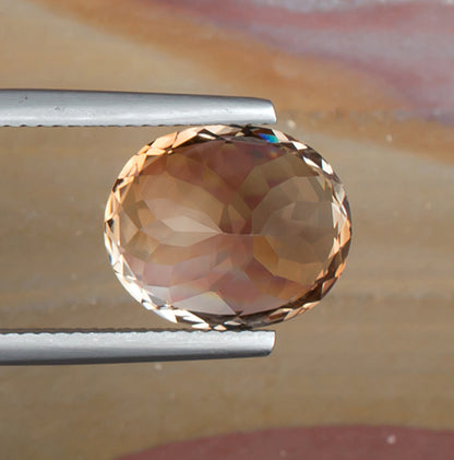 8.67ct Precious Topaz Colored Gemstone Bottom View Natural Background

