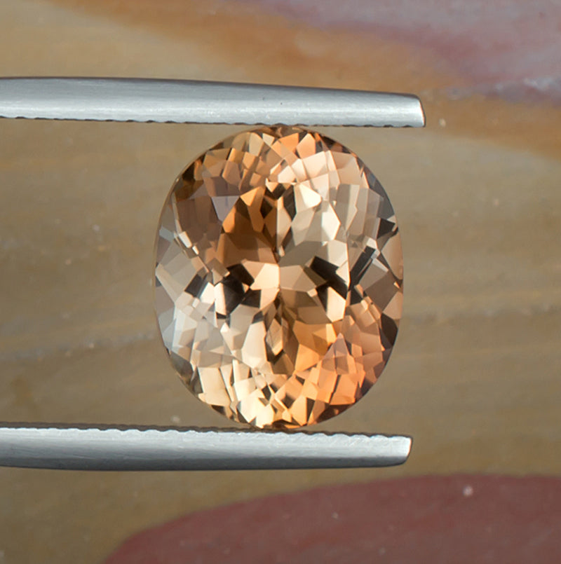 8.67ct Precious Topaz Colored Gemstone Top View Natural Background 
