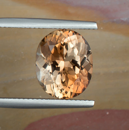 8.67ct Precious Topaz Colored Gemstone Top View Natural Background 
