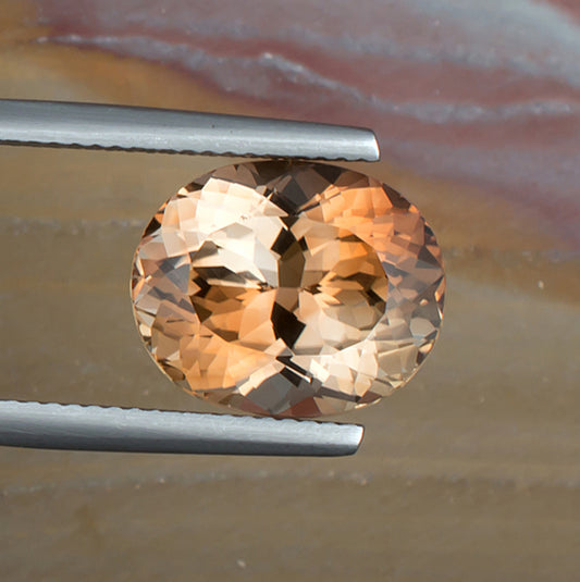 8.67ct Precious Topaz Colored Gemstone Top View Natural Background
