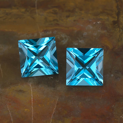 8mm Blue Topaz Colored Gemstone Pair Top View Natural Background
