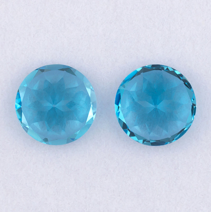 9.17twt Blue Topaz Colored Gemstone Pair Bottom View White Background
