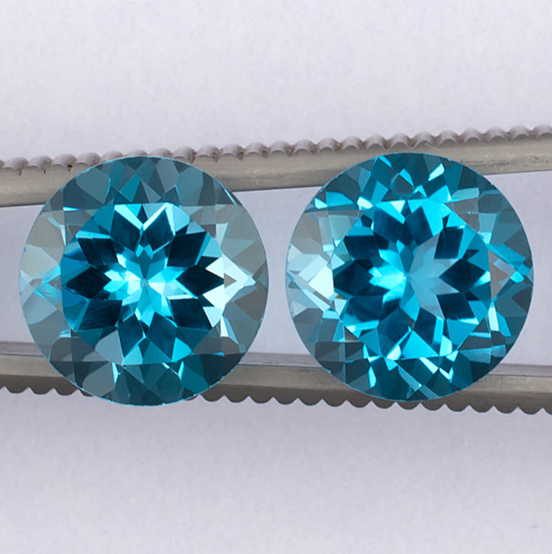 9.17twt Blue Topaz Colored Gemstone Pair Top View White Background
