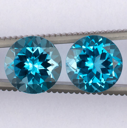 9.17twt Blue Topaz Colored Gemstone Pair Top View White Background
