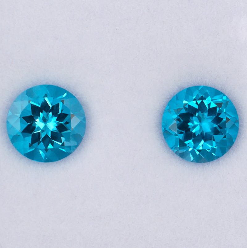 9.17twt Blue Topaz Colored Gemstone Pair Top View White Background 
