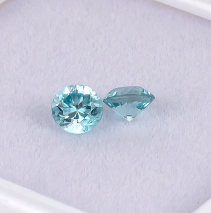 Blue Zircon Colored Gemstone Pair Top View White Background
