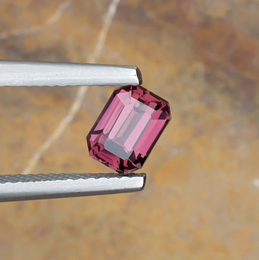 Magenta Spinel Colored Gemstone Top View Natural Background