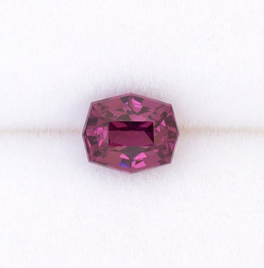 0.92ct Rhodolite Garnet Colored Gemstone Top View White Background